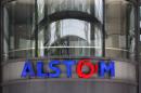FILE - This Wednesday, April 30, 2014 file photo shows the company logo of Alstom at the headquarters of the leading global maker of high-speed trains, power plants and grids, in Levallois-Perret, outside Paris, France. U.S Justice Department officials on Monday Dec. 22, 2014 announced French power and transportation company has agreed to pay $772 million in penalties to resolve allegations that it bribed government officials in multiple foreign countries and would plead guilty to violating the Foreign Corrupt Practices Act. (AP Photo/Christophe Ena, File)