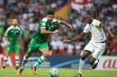 Omar Ibrahim Othman of Saudi Arabia (right) battles for the ball with Mohanad Abdulraheem Karrar of Iraq during a World Cup qualifier in Shah Alam, Malaysia, on September 6, 2016