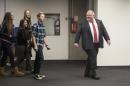 Toronto Mayor Rob Ford leads a tour of city hall staff member's children around the offices at city hall on take you kids to work day, Wednesday, Nov. 6, 2013 in Toronty. City councilors called on the deputy mayor to "orchestrate a dignified" departure for Ford, who was greeted by angry protesters on his first day of work after acknowledging he smoked crack. Ford took a back stairway to his office to avoid a crush of media and protestors. (AP Photo/The Canadian Press, Chris Young)