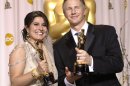 Sharmeen Obaid-Chinoy, left, and Daniel Junge pose with their awards for best documentary short for 