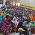 In this photo taken Monday, March 19, 2012, Somalis attend a concert by Somali singers at the Somali National Theater in Mogadishu, Somalia. An official says two of Somalia's top sports officials were killed in a suicide blast Wednesday, April 4, 2012 at Somalia's newly reopened national theater that left at least 10 dead. (AP Photo/Farah Abdi Warsameh)