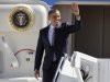 President Barack Obama waves as he walks from Air Force One upon arriving at Buckley Air Force Base in Denver, Tuesday, Sept. 27, 2011. (AP Photo/Joe Mahoney)