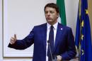 Italy's Prime Minister Renzi speaks during a meeting on the sidelines at a Europe-Asia summit (ASEM) in Milan