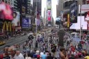 Tourists gather in Times Square in New York