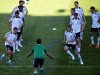 Germany's players warm up during a training session in Lviv