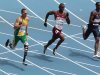 South Africa's Oscar Pistorius, left, Qatar's Femi Ogunode, center, and USA's Tony McQuay compete in a heat of the Men's 400m at the World Athletics Championships in Daegu, South Korea, Sunday, Aug. 28, 2011.  (AP Photo/Kevin Frayer)