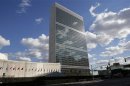 Clouds are reflected off the Secretariat Building of the UN headquarters during the 67th United Nations General Assembly, in New York