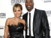 FILE - In this March 7, 2012, file photo, NFL football player Chad Johnson, right, poses with his fiancee, Evelyn Lozada, at an event in New York. Johnson was arrested Saturday, Aug. 11, 2012, on a domestic violence charge, accused of head-butting Lozada during an argument in front of their home outside Miami. Johnson and Lozada, now married, were at dinner and she confronted him about a receipt she had found for a box of condoms, said Davie police Capt. Dale Engle. The argument got heated and continued on the drive home, he said. (AP Photo/Evan Agostini, File)