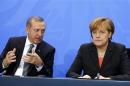 German Chancellor Merkel and Turkey's Prime Minister Erdogan address the media after talks in Berlin