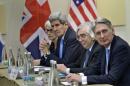 U.S. Under Secretary for Political Affairs Sherman, U.S. Secretary of State Kerry, U.S. Secretary of Energy Moniz and British Foreign Secretary Hammond wait for a P5+1 meeting in Lausanne