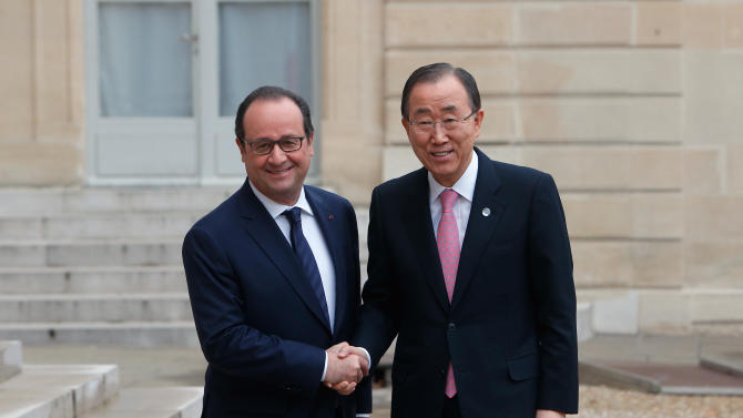 France&#39;s President Francois Hollande, left, shakes hand with Secretary General of the United Nations Ban Ki-moon, prior to a meeting at the Elysee Palace, in Paris, Sunday, Nov. 29, 2015. More than 140 world leaders are gathering around Paris for high-stakes climate talks that start Monday, and activists are holding marches and protests around the world to urge them to reach a strong agreement to slow global warming. (AP Photo/Thibault Camus)