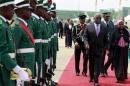 Sao Tome and Principe's President Manuel Pinto da Costa arrives at the airport in Abuja