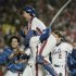 FILE - In this Oct. 27, 1986, file photo, New York Mets Gary Carter is lifted in the air by relief pitcher Jese Orosco following the Met 8-5 victory over the Boston Red Sox in Game 7 of baseballs World Series at New York's Shea Stadium. Baseball Hall of Fame president Jeff Idelson said Thursday, Feb. 16, 2012, that Hall of Fame catcher Gary Carter has died. (AP Photo/Paul Benoit, File)