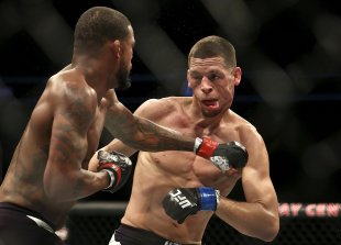 Nate Diaz put on a show against Michael Johnson, but was it enough to land him a shot at Conor McGregor? (AP)