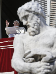 Pope Benedict XVI blesses the faithful from his studio's window overlooking St.Peter's square during the Angelus noon prayer, at the Vatican, Sunday, Feb. 10, 2013. (AP Photo/Gregorio Borgia)