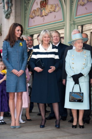 Duchess Catherine, Duchess Camilla, and Queen Elizabeth all dressed in blue