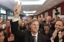 Miro Cerar, leader of the SMC, gestures after seeing preliminary results of elections in Ljubljana