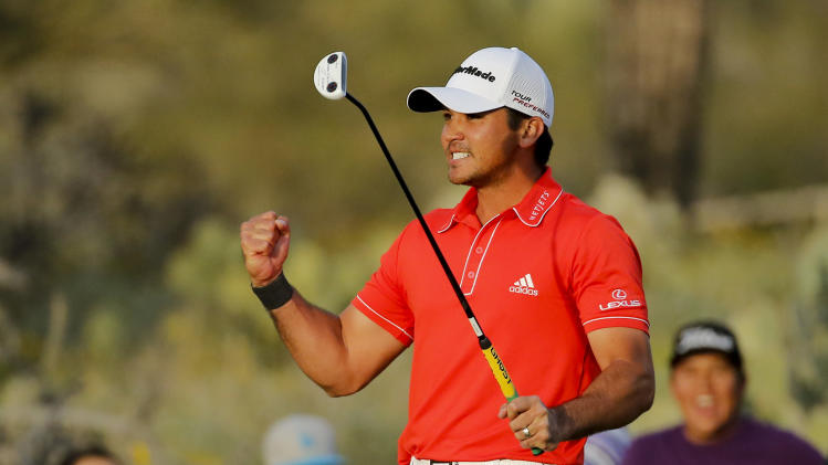 Jason Day, of Australia, celebrates on the 23rd hole after winning his championship match against Victor Dubuisson, of France, during the Match Play Championship golf tournament, Sunday, Feb. 23, 2014, in Marana, Ariz. (AP Photo/Matt York)