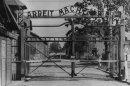 FILE - An undated image shows the main gate of the Nazi concentration camp Auschwitz in Poland, which was liberated by the Russians, January 1945. Writing over the gate reads: "Arbeit macht frei" (Work Sets You Free). A 93-year-old man who was deported from the U.S. for lying about his Nazi past was arrested by German authorities Monday May 6, 2013 on allegations he served as an Auschwitz death camp guard, Stuttgart prosecutors said. Hans Lipschis was taken into custody after authorities concluded there was 