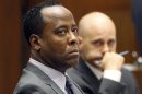 FILE - In this Oct. 3, 2012Dr. Conrad Murray listens to testimony seated near his attorney Nareg Gourjian, right, during Murray's trial in the death of Michael Jackson in Los Angeles. Attorney J. Michael Flanagan is to appear Friday, Feb. 24, 2012, to argue a motion he has filed saying that Conrad Murray should be released either on his own recognizance or on bail with an electronic monitoring ankle bracelet. Murray is in a Los Angeles County jail. (AP Photo/Mario Anzuoni, Pool)