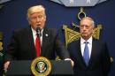 U.S. Defense Secretary Mattis listens to remarks by President Donald Trump at the Pentagon in Washington