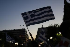 Supporters of the No vote wave Greek flags after the &hellip;