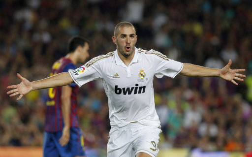 Real Madrid's Karim Benzema from France celebrates his goal during a second leg Spanish Supercup soccer match against FC Barcelona at the Camp Nou stadium in Barcelona, Spain, Wednesday, Aug. 17, 2011. (AP Photo/Andres Kudacki)
