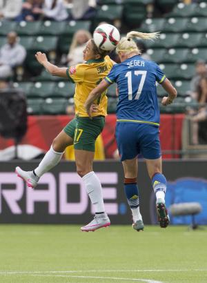 Australia advances in World Cup with 1-1 draw against …