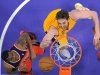 Los Angeles Lakers forward Pau Gasol, right, of Spain, and Washington Wizards forward Trevor Booker go after a rebound during the first half of an NBA basketball game, Friday, March 22, 2013, in Los Angeles. (AP Photo/Mark J. Terrill)