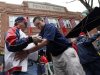 Fans pass through security before entering Fenway Park for a baseball game between the Boston Red Sox and the Kansas City Royals in Boston, Saturday, April 20, 2013. (AP Photo/Michael Dwyer)