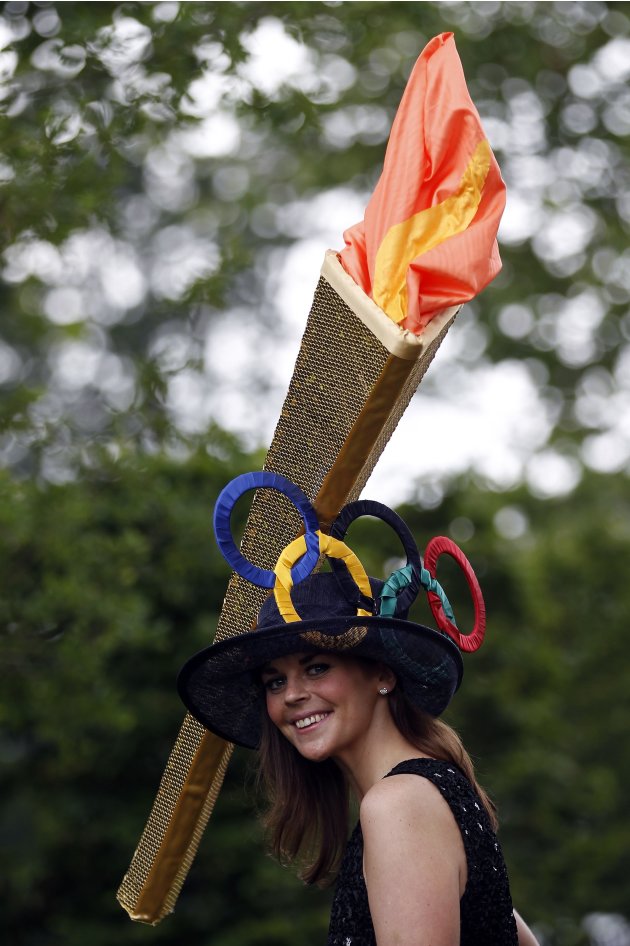 Racegoer Nelson poses for photographs on Ladies Day, the third day of racing at the Royal Ascot, southwest of London