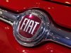 A Fiat logo is seen on a car during a press preview at the 2013 New York International Auto Show in New York