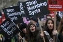 Protestors in London take part in a demonstration against bombing Syria