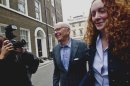 FILE In this Sunday, July 10, 2011 file photo Chairman of News Corporation Rupert Murdoch, left, and then chief executive of News International Rebekah Brooks leave his residence in central London. British police made six arrests early Tuesday March 13, 2012 in the British media's phone hacking scandal, including Rebekah Brooks, the former top executive of Rupert Murdoch's News International, The Associated Press has learned. (AP Photo/Sang Tan, File)