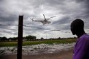 A U.N. helicopter lands at the airstrip in Pibor