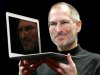 FILE - In this Jan. 15, 2008, file photo, Apple CEO Steve Jobs holds up the new MacBook Air after giving the keynote address at the Apple MacWorld Conference in San Francisco. Apple on Wednesday, Oct. 5, 2011 said Jobs has died. He was 56. (AP Photo/Jeff Chiu, File)