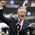 Tommy Tuberville pumps his fist as he was introduced as the new head football coach at the University of Cincinnati, Saturday, Dec. 8, 2012, in Cincinnati. Tuberville had been head coach at Texas Tech, and previously at Auburn and Mississippi. (AP Photo/Al Behrman)