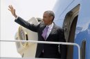 U.S. President Barack Obama waves from Air Force One at Chicago's O'Hare Airport