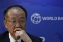 World Bank President Jim Yong Kim listens to a question during a news conference in New Delhi