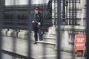 File photograph showing an armed police officer on duty in Downing Street, in London