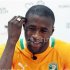 Ivory Coast's Yaya Toure smiles during an interview following the launch of Puma's kits for nine African national soccer teams at the Design Museum in London