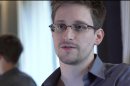 FILE - This Sunday, June 9, 2013 file photo provided by The Guardian Newspaper in London shows Edward Snowden, in Hong Kong. Russian state news agency said Wednesday, July 24, 2013 that US leaker Edward Snowden has been granted a document that allows him to leave the transit zone of a Moscow airport and enter Russia. Snowden has applied for temporary asylum in Rusia last week after his attempts to leave the airport were thwarted. The United States wants him sent home to face prosecution for espionage. (AP Photo/The Guardian, Glenn Greenwald and Laura Poitras, File)
