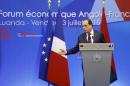 French President Francois Hollande addresses the Forum Economique Angola-France in Angola's capital Luanda