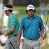 Jason Dufner, right, reacts in front of Keegan Bradley after missing a birdie putt on the 17th hole during the third round of the PGA Championship golf tournament Saturday, Aug. 13, 2011, at the Atlanta Athletic Club in Johns Creek, Ga. Dufner is tied for the lead with Brendan Steele at 7 under par. (AP Photo/Charlie Krupa)