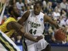 Colorado State forward Greg Smith (44) drives against Missouri guard Keion Bell (5) during the first half  their second-round NCAA college basketball tournament game on Thursday, March 21, 2013, in Lexington, Ky. (AP Photo/John Bazemore)