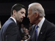 Republican vice-presidential nominee Paul Ryan and U.S. Vice President Joe Biden (R) chat at the conclusion of the U.S. vice presidential debate in Danville, Kentucky, October 11, 2012. REUTERS/Michael Reynolds/POOL