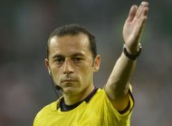 Turkey's Cuneyt Cakir, seen here on June 18, will referee the Euro 2012 semi-final between holders Spain and Portugal in Donetsk, Ukraine (AFP Photo/ODD ANDERSEN)