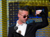 In a March 9, 2011 photo Mike "The Situation" Sorrentino appears onstage at the Comedy Central Roast of Donald Trump in New York.   Abercrombie & Fitch Co. says in a news release Tuesday Aug. 16, 2011 that they are concerned that having Sorrentino  seen in its clothing could cause "significant damage" to the company's image, and has offered a payment for him and other cast members of "Jersey Shore" to not wear the company's clothes on the show. (AP Photo/Charles Sykes)