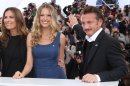Actress Roberta Armani, left, model Petra Nemcova and actor Sean Penn pose during a photo call for the Haiti Carnival charity event at the 65th international film festival, in Cannes, southern France, Friday, May 18, 2012. (AP Photo/Joel Ryan)