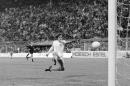FILE - In this July 3, 1974 file photo, Dutch forward Johann Cruyff scores his team's second goal against Brazil in their World Cup Soccer match, in Dortmund, West Germany. On this day: The Netherlands beats Brazil 2-0 to qualify for the World Cup final. (AP Photo, File)